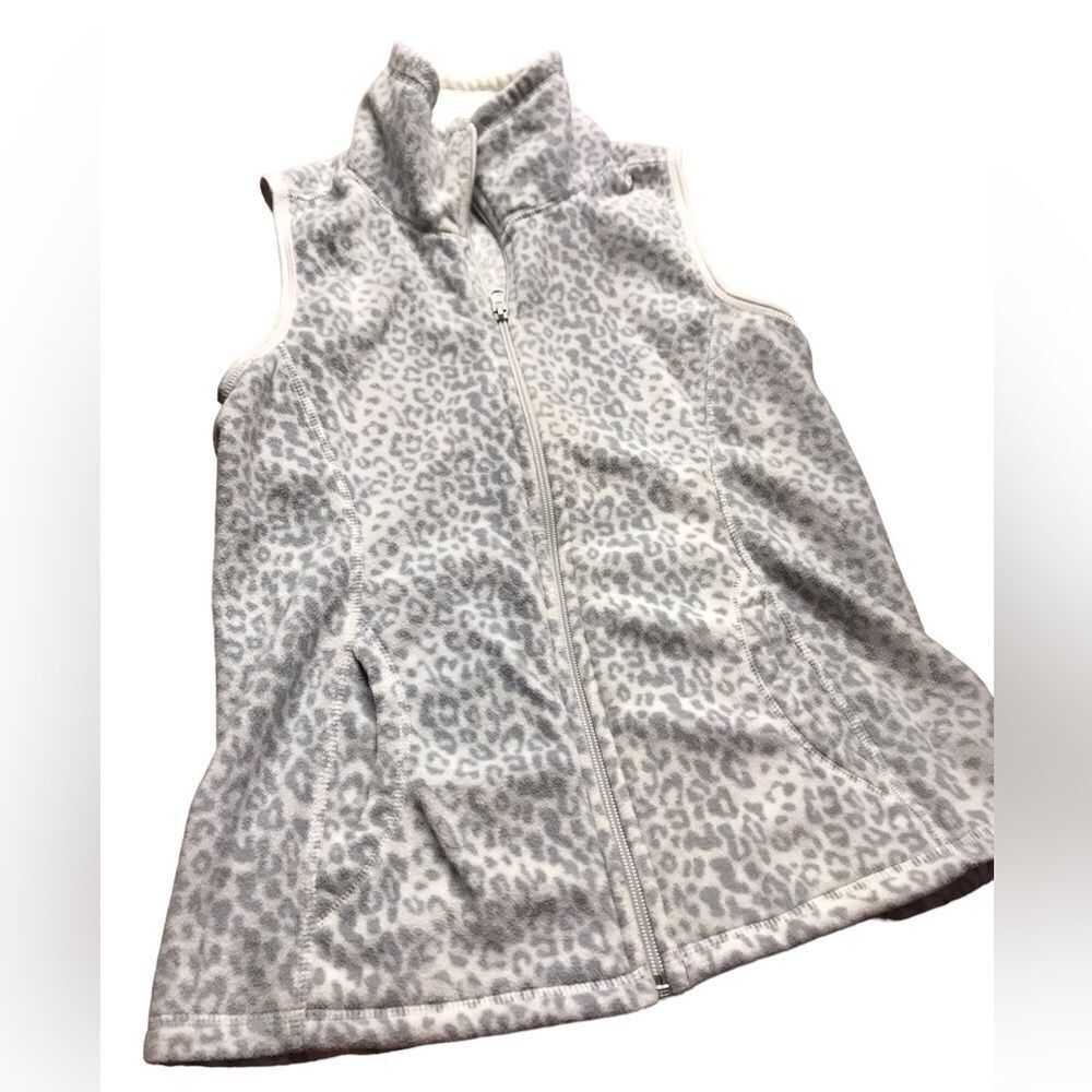 Old. Any size medium fleece cheetah print vest excellent condition